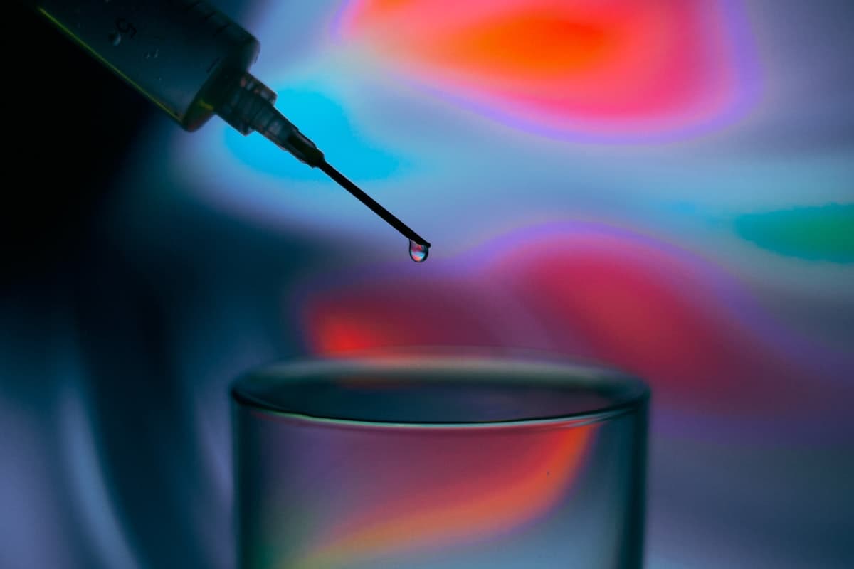 Single liquid droplet suspended in a glass of water