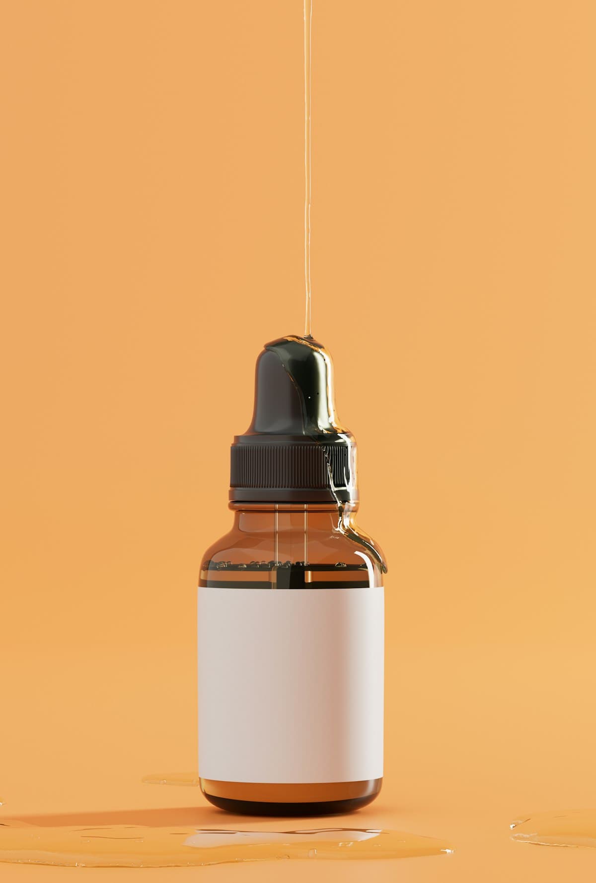 Amber dropper bottle on a coloured background